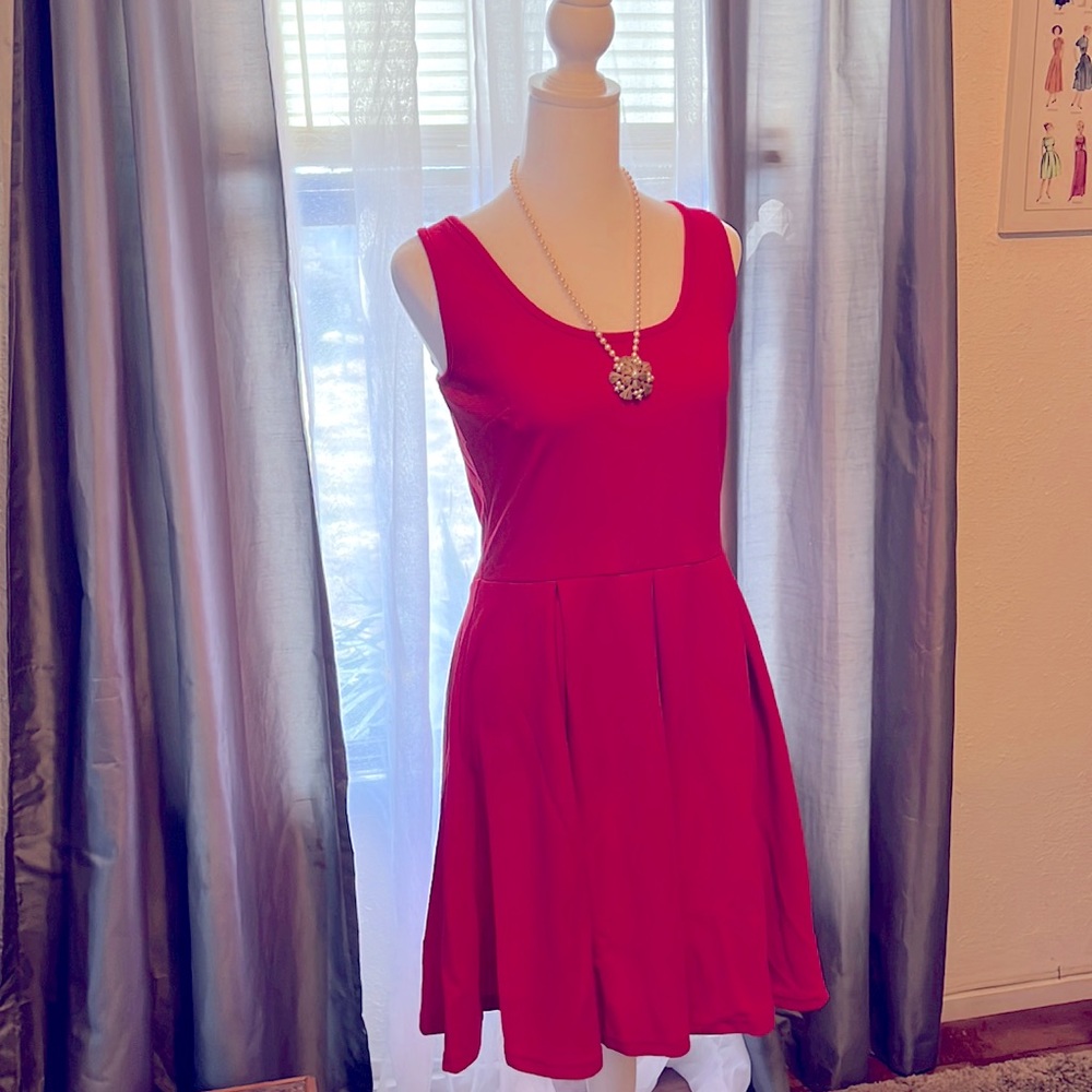 The lil red dress. Size medium. It’s comfortable and successful.